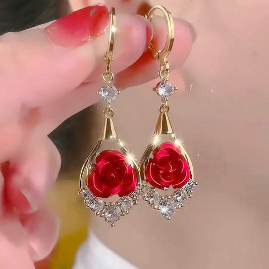🌹✨【Kupte 1 a získejte 1 zdarma】Luxusní a elegantní diamantem osázené růžové náušnice