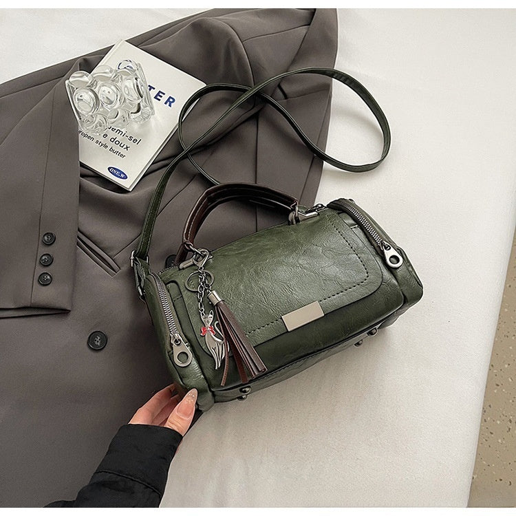 👜Bolso bandolera para mujer con diseño de borlas de estilo retro y patchwork de color liso, 2026