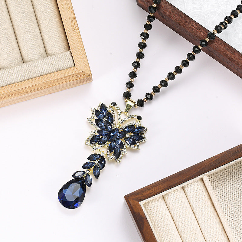 🔥GORĄCA WYPRZEDAŻ 2025🔥【Kup 1, odbierz 2 】Przyczepa do swetra na jesień/zimę – Elegancki naszyjnik z sznurka z kryształu-4164652