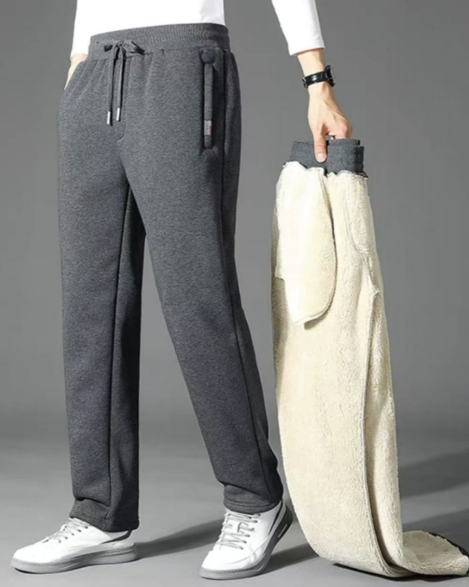 👖【M-5XL】Zimowe męskie spodnie sportowe na zimę 2025 z grubym ociepleniem z futerka owczego, casualowe, ciepłe i komfortowe.