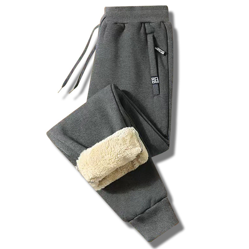 👖【M-5XL】Zimowe męskie spodnie sportowe na zimę 2025 z grubym ociepleniem z futerka owczego, casualowe, ciepłe i komfortowe.