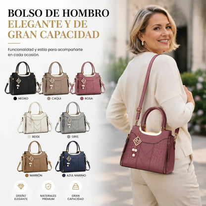 Bolso bandolera para mujer con costuras en forma de V, herrajes dorados, múltiples compartimentos y asa superior.