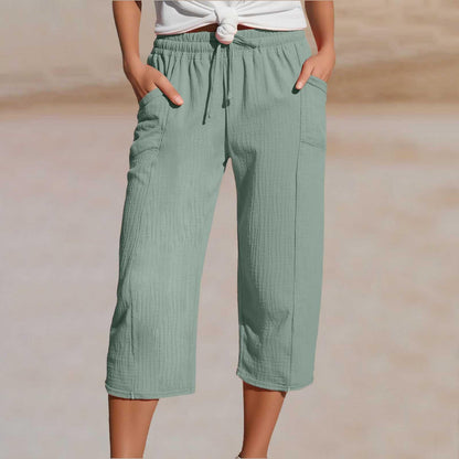 🌸【Compra 1 y llévate 1 gratis】Pantalones cropped plisados de color sólido para mujer, de algodón y lino