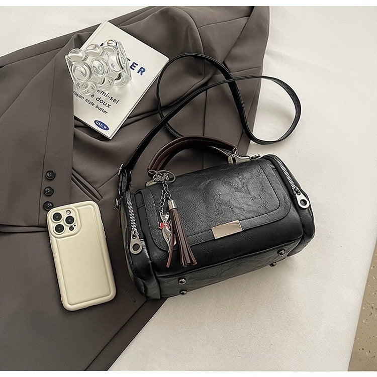 👜Bolso bandolera para mujer con diseño de borlas de estilo retro y patchwork de color liso, 2026